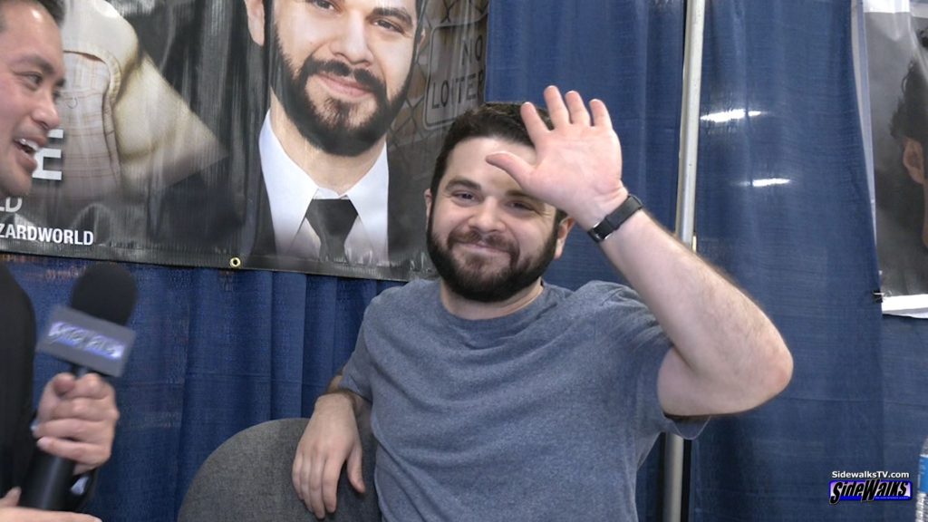 Samm Levine smiles at Wizard World