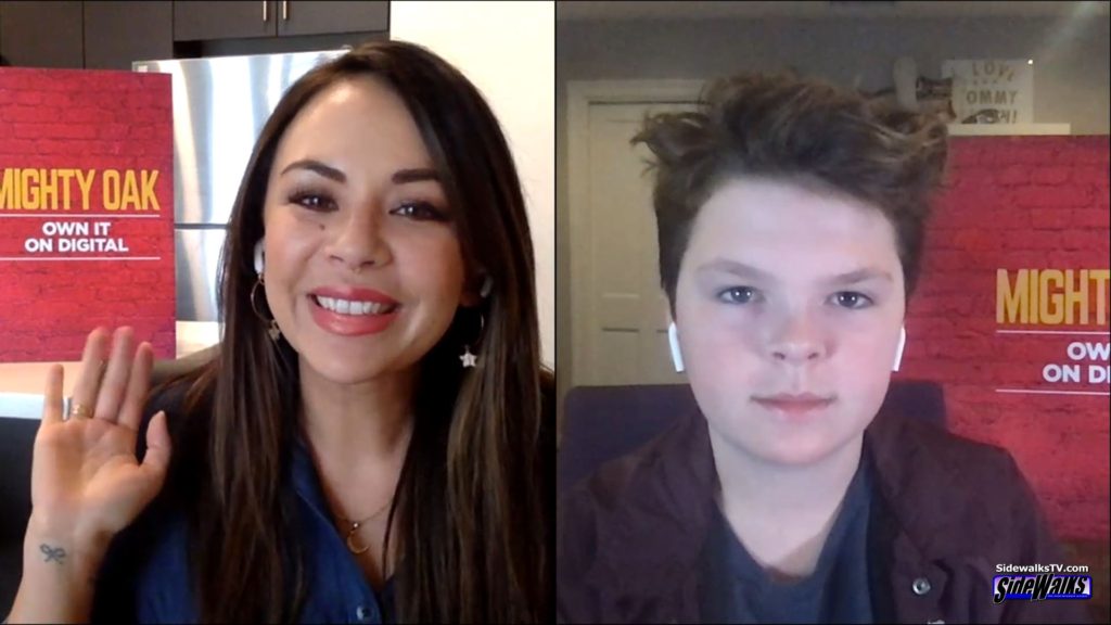 Janel Parrish and Tommy Ragen in a two shot