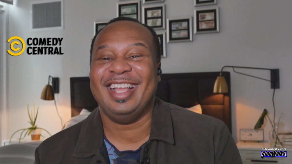 Roy Wood Jr smiling