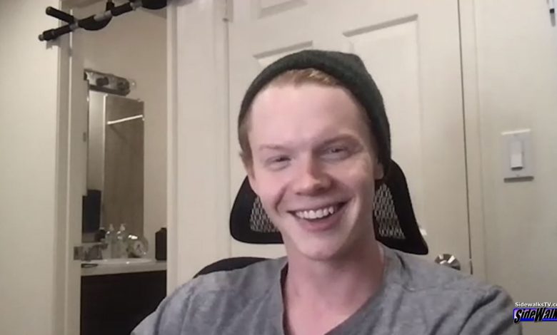 Sam Bullington is smiling in a single shot during Sidewalks Ent. interview