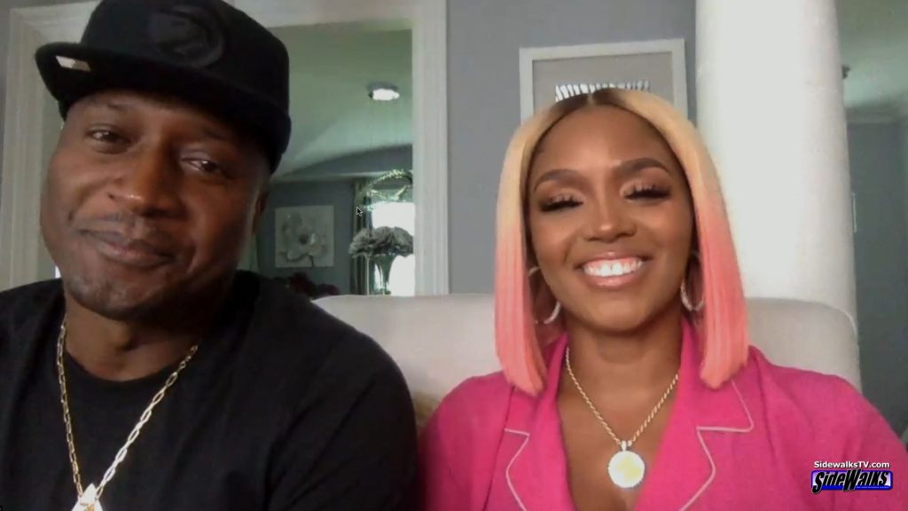 Husband and wife Kirk and Rasheeda Frost sitting during our interview