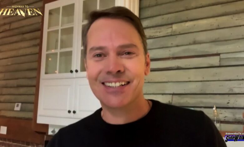 Barry Watson smiles toward camera
