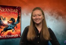 Author AF Steadman with book behind her