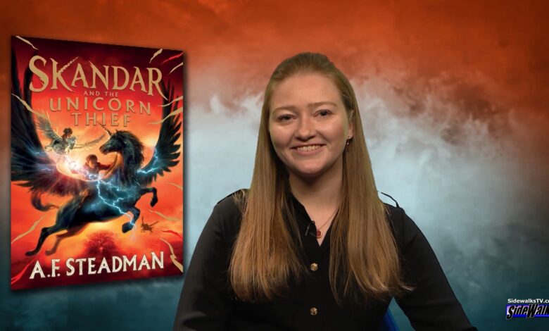 Author AF Steadman with book behind her