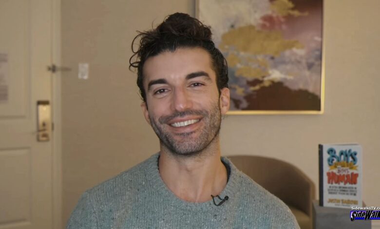 Justin Baldoni smiles