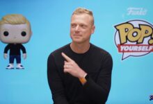 Dave Beré, the Vice President of Brand & Marketing at Funko, points to his Funko’s Pop! Yourself version of himself