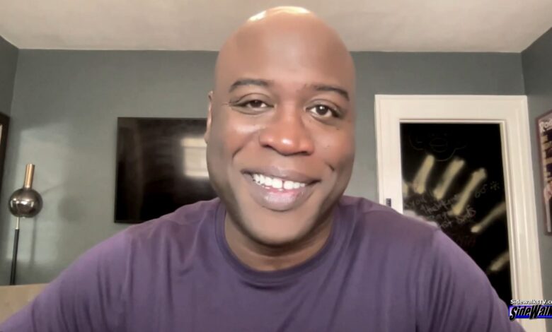 Kevin Daniels smiles