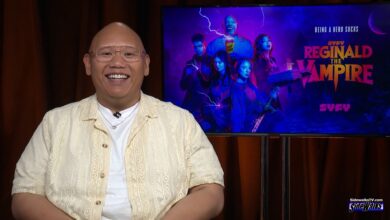 Jacob Batalon sitting and smiling
