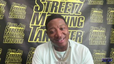 Yung Joc smiles