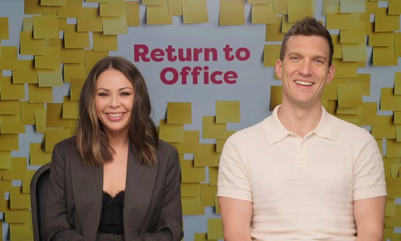 Janel Parrish and Scott Michael Foster with big smiles