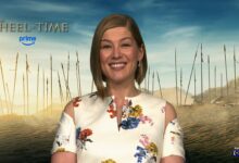 Rosamund Pike smiles