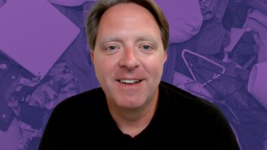 Matt Paxton with a purple background