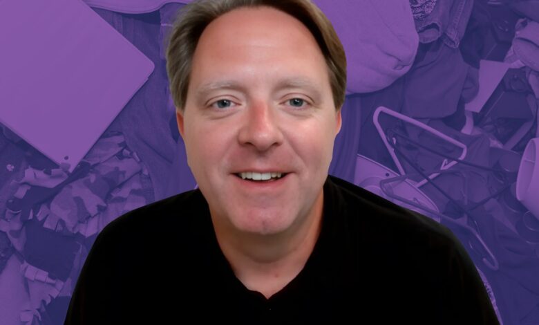 Matt Paxton with a purple background