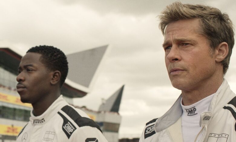 DAMSON IDRIS as Joshua Pearce and BRAD PITT as Sonny Hayes