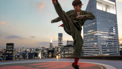 Ben Wang with his leg up high in still photo