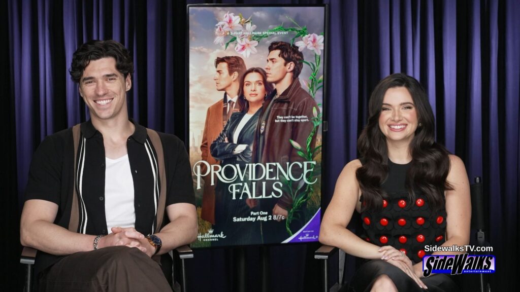 Katie Stevens and Lachlan Quarmby smile during the interview