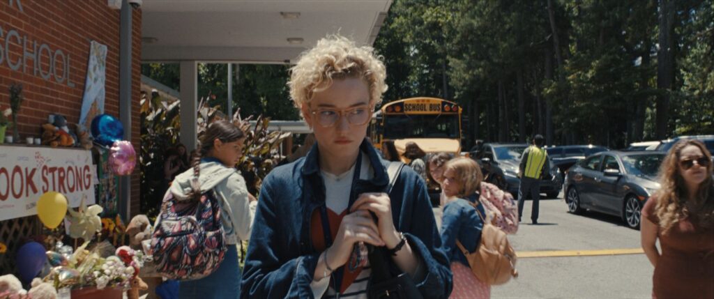 JULIA GARNER in a still of Weapons