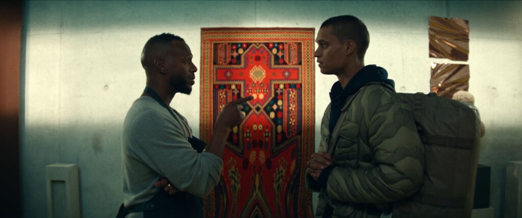Isaiah (Marlon Wayans) and Cam (Tyriq Withers) looking at each other in a still photo