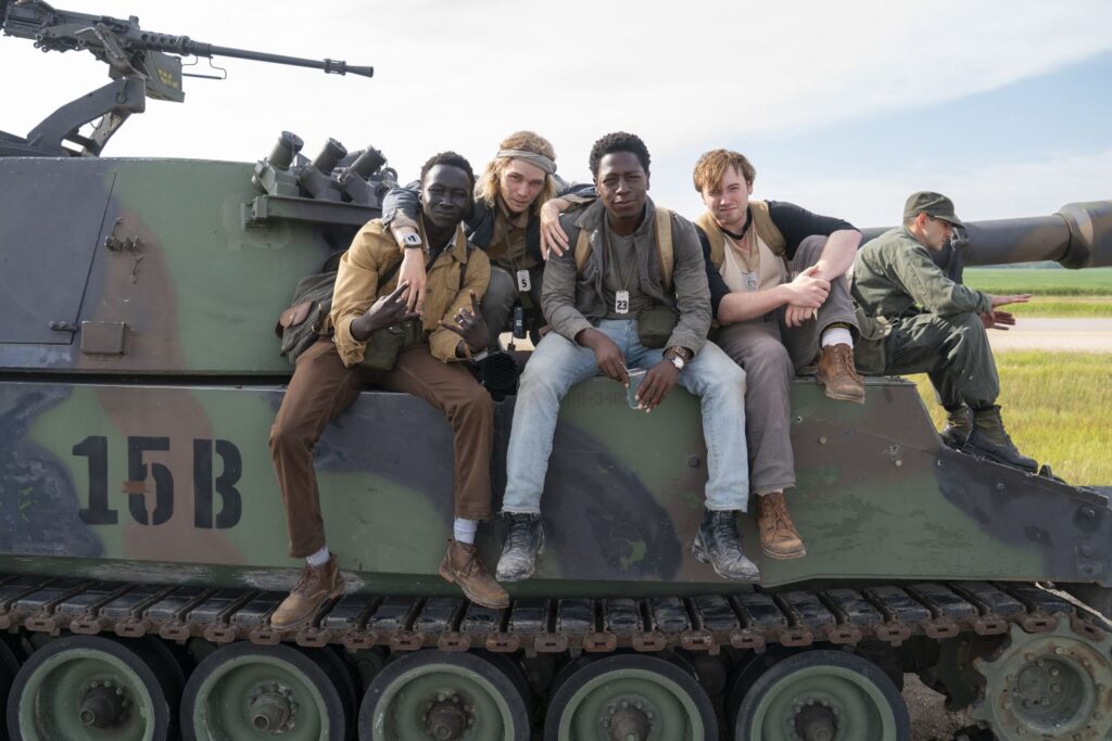 Cast photo of Tut Nyuot, Charlie Plummer, David Jonsson, and Cooper Hoffman.