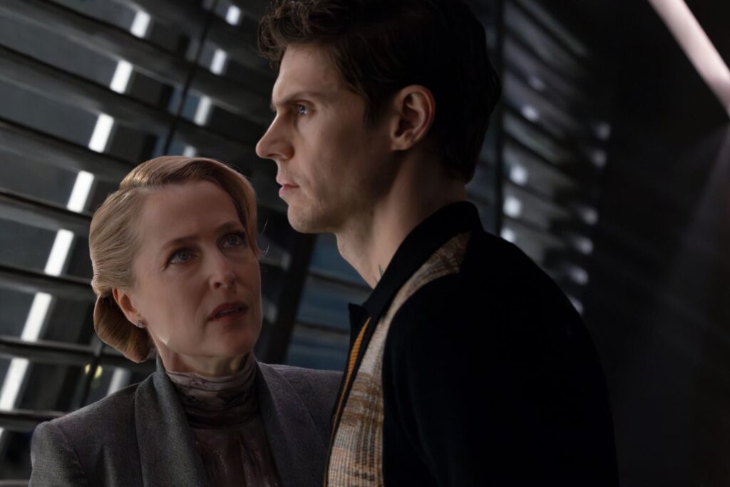 Gillian Anderson as Elisabeth Dillinger and Evan Peters as Julian Dillinger in a still from the movie