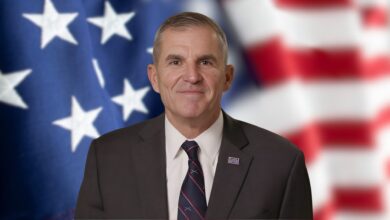 Lt. Gen. (Ret.) Michael Linnington with American flag in the background