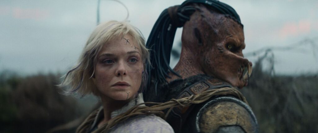 Thia (Elle Fanning) and Dek (Dimitrius Schuster-Koloamatangi) in a film still