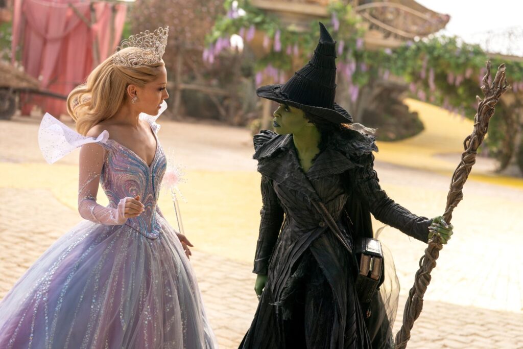 Ariana Grande is Glinda and Cynthia Erivo is Elphaba in a still from the film.