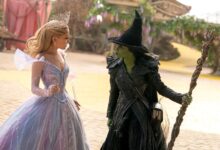 Ariana Grande is Glinda and Cynthia Erivo is Elphaba in a still from the film.