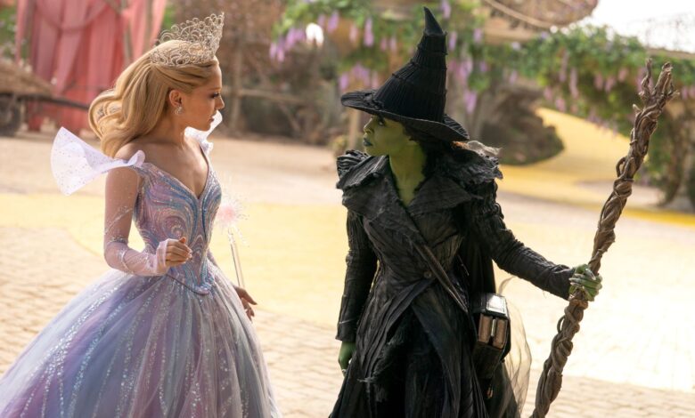 Ariana Grande is Glinda and Cynthia Erivo is Elphaba in a still from the film.