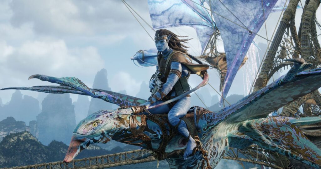 Jake Sully, a Na'vi warrior, rides an Ikran (mountain banshee) in flight above the floating Hallelujah Mountains of Pandora.