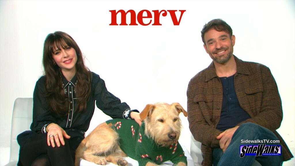 All smiles Zooey Deschanel and Charlie Cox with Gus 