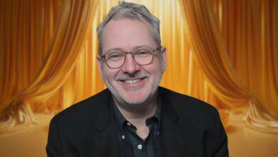 Morgan Neville with a curtain behind him