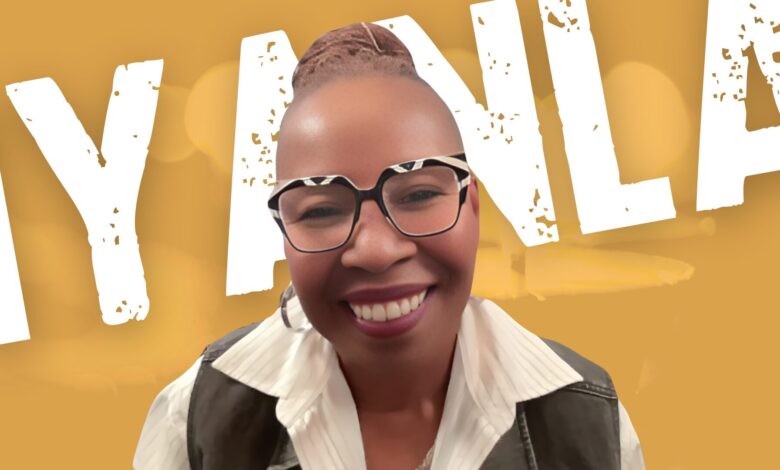 Iyanla Vanzant with her first name in white behind her.