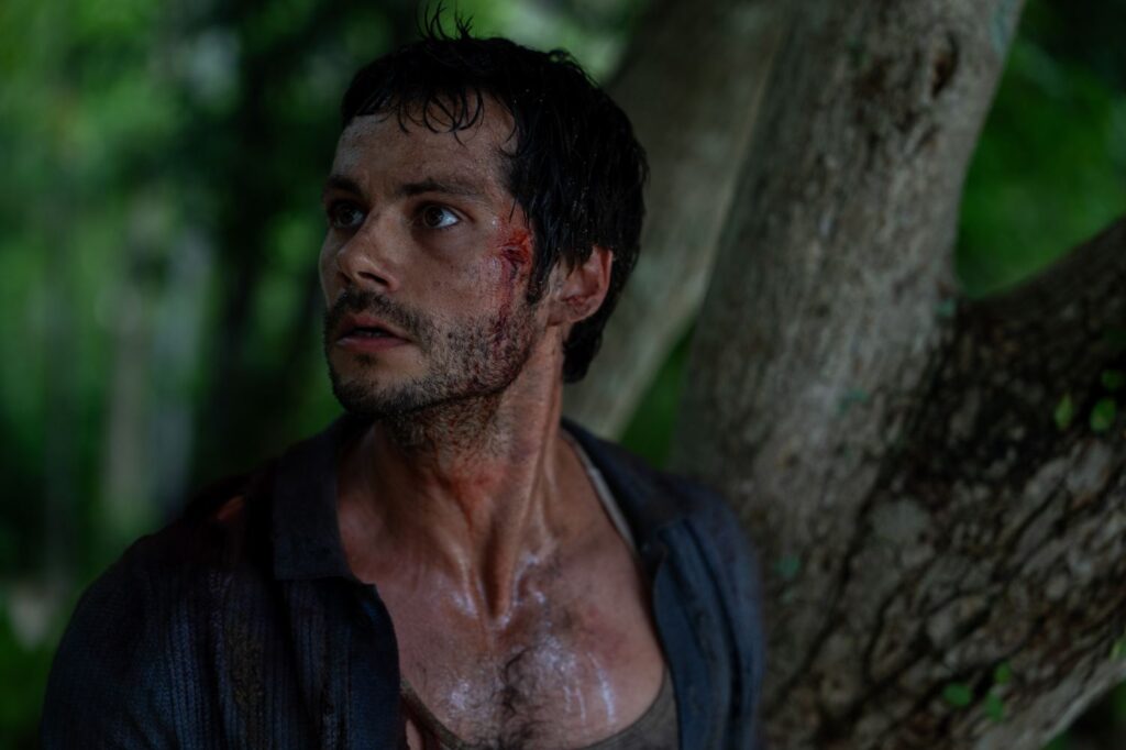 Dylan O'Brien as Bradley Preston with blood on his face