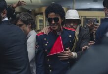 In a film still, Jaafar Jackson as Michael Jackson and KeiLyn Durrel Jones as Bill Bray in Michael.
