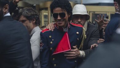 In a film still, Jaafar Jackson as Michael Jackson and KeiLyn Durrel Jones as Bill Bray in Michael.