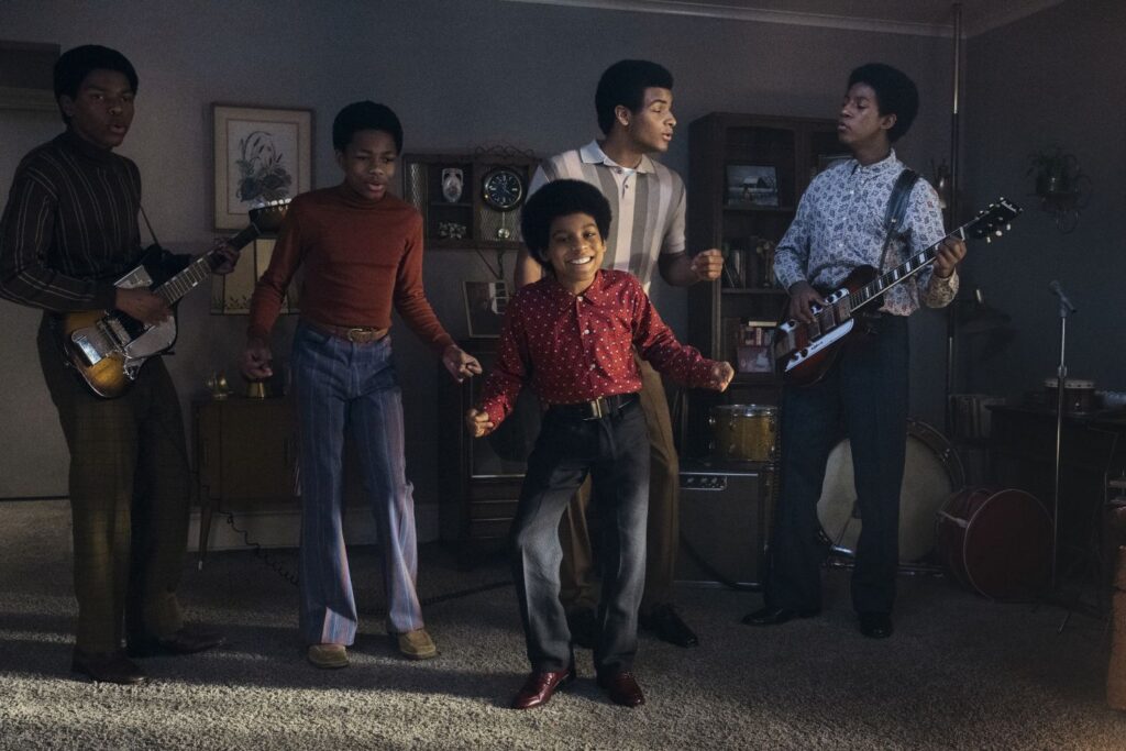 In a film still, Judah Edwards as Young Tito, Jaylen Hunter as Young Marlon, Juliano Krue Valdi as Young MJ, Nathaniel McIntyre as Young Jackie and Jayden Harville as Young Jermaine in Michael.