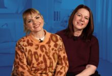 Rufi Thorpe and Eva Anderson with a blue-tinted background of the set.