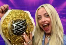 Liv Morgan holding the belt