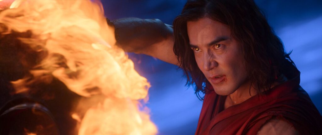 LUDI LIN as Liu Kang in a production still.