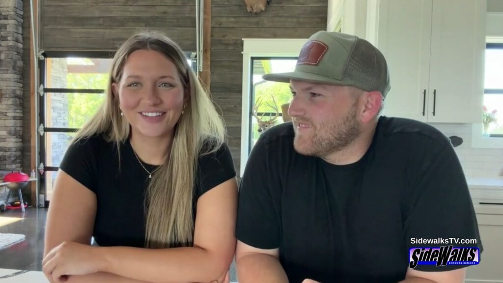 Kacie Adkison smiling and Cole McBee looking toward Kacie.