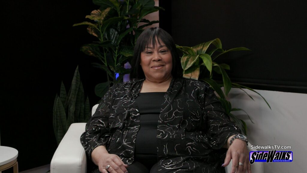 Martha Wash looks toward the camera.