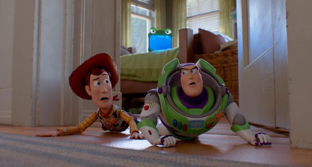 Woody and Buzz Lightyear on the floor.
