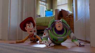 Woody and Buzz Lightyear on the floor.