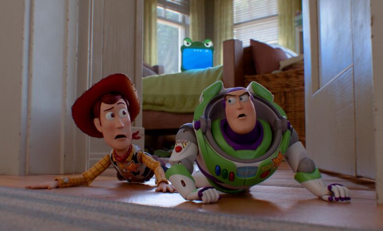 Woody and Buzz Lightyear on the floor.