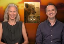Filmmakers Sophie Darlington & Simon Blakeney with a poster of "LION."