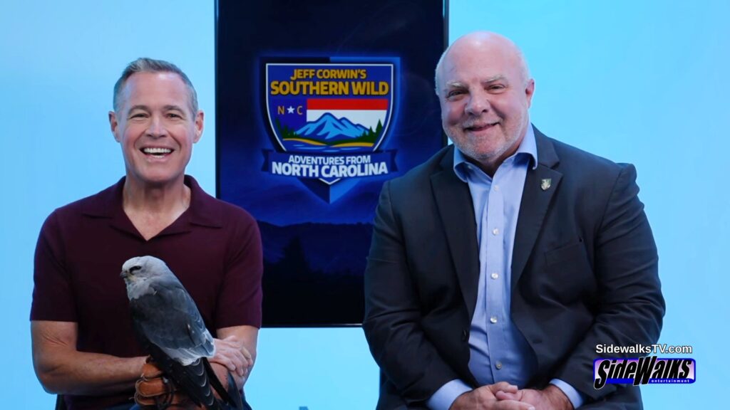 Jeff Corwin and Dr. Lee King smiling.