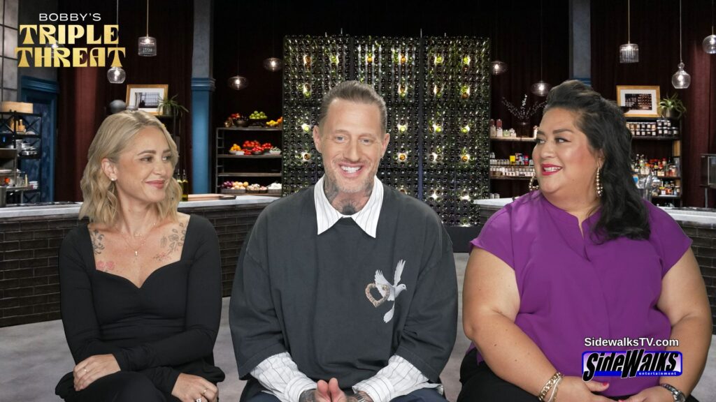 Brooke Williamson, Michael Voltaggio and Ayesha Nurdjaja withe ladies looking toward Michael.