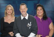 Brooke Williamson, Michael Voltaggio and Ayesha Nurdjaja from Bobby's Triple Threat smiling with a kitchen background.