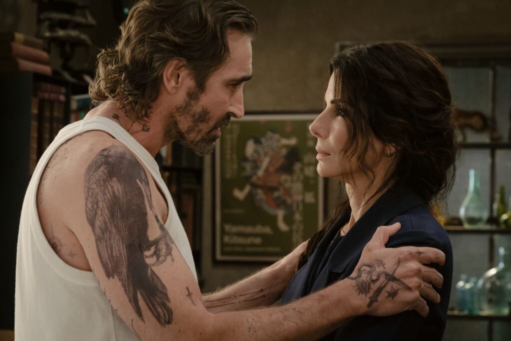 LEE PACE as Ian Wright and SANDRA BULLOCK as Sally looking at each other.